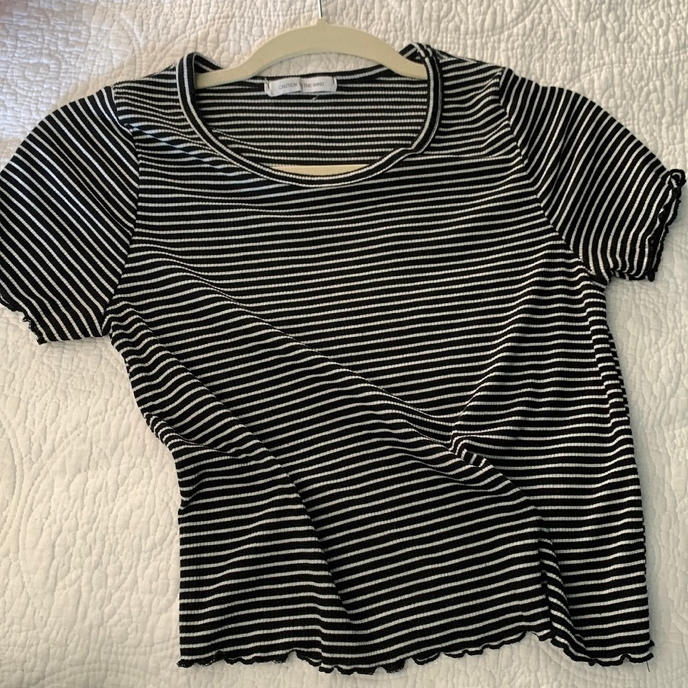 Cropped top caution to the wind